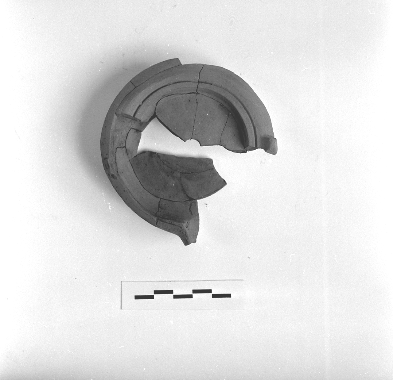 lucerna, Buchi X a (sec. II d.C)