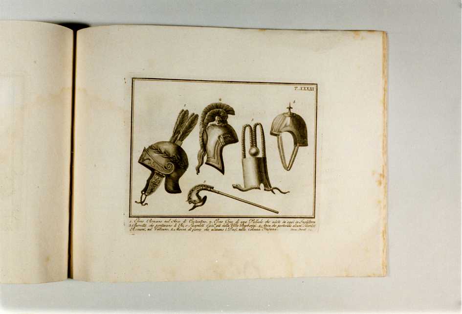 ELMO ROMANO; ELMO GRECO; BARRETTA DI RE E SACERDOTI; COPRICAPO DA SACERDOTE ROMANO; MAZZA DI FERRO DACIA (stampa, serie) di Pronti Domenico (fine/ inizio secc. XVIII/ XIX)