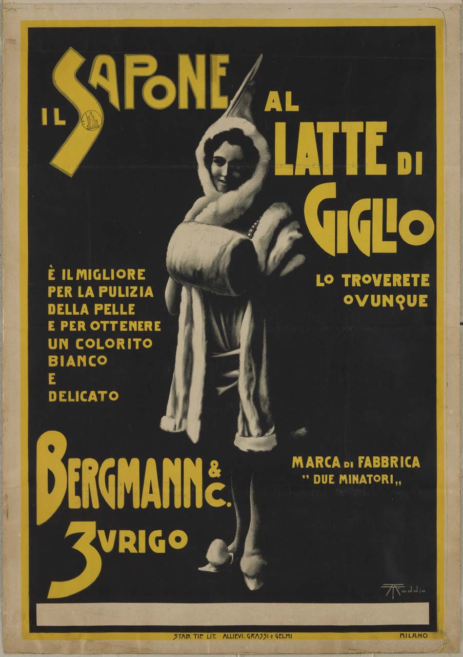 Il sapone al latte di giglio, donna avvolta in un cappotto bianco bordato di pelliccia così come lo scaldamani (manifesto) di Taddio Arturo (fine/ inizio sec. XIX-XX)