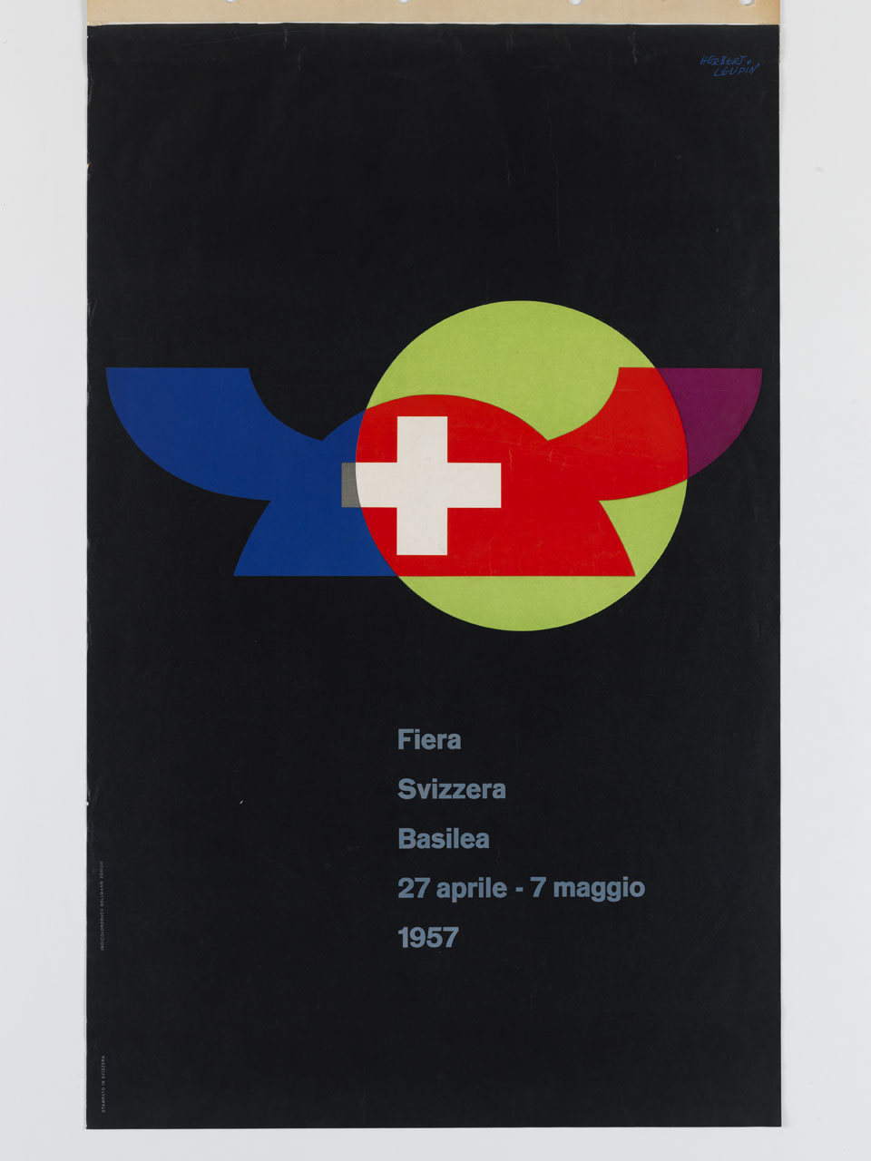 cerchio giallo e marchio della Fiera Svizzera Basilea intersecati su fondo nero (manifesto) di Leupin Herbert (sec. XX)