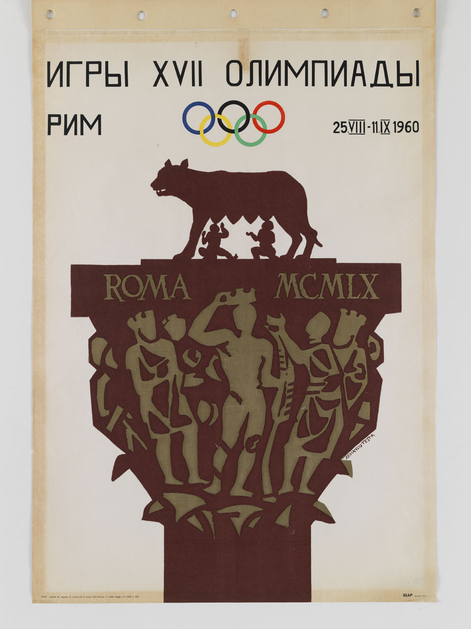 sagoma della Lupa capitolina allatta Romolo e Remo sopra un capitello figurato (manifesto) di Testa Armando (sec. XX)