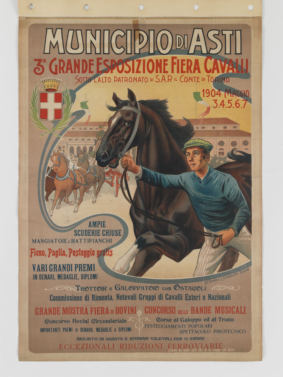 fantino tiene un cavallo per il morso mentre a fianco altri cavalli tirano una carrozza sullo sfondo di un grande edificio all’interno di cornice floreale (manifesto) - ambito piemontese (sec. XX)