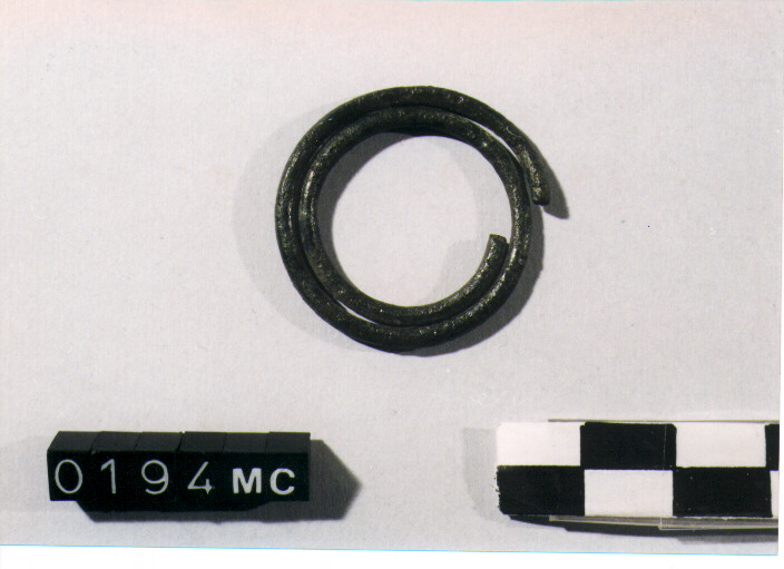 FIBULA A QUATTRO SPIRALI/ FRAMMENTO - CULTURA TOMBE A FOSSA (SEC. VIII A.C)