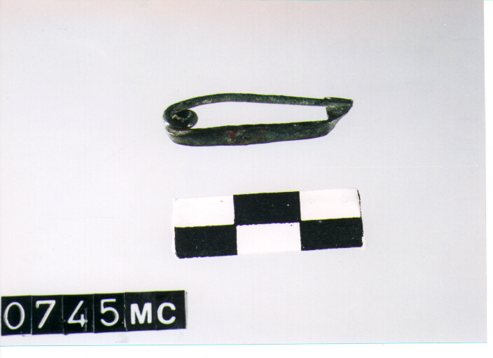 fibula/ frammento - CULTURA TOMBE A FOSSA (SECC. IX/VIII A.C)