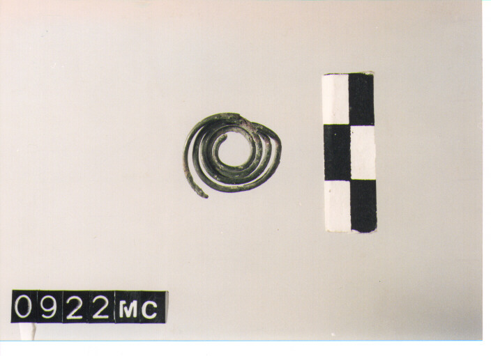 FIBULA A QUATTRO SPIRALI/ FRAMMENTO - CULTURA TOMBE A FOSSA (SEC. VIII A.C)