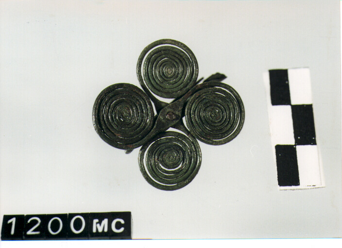FIBULA A QUATTRO SPIRALI - CULTURA TOMBE A FOSSA (SEC. VIII A.C)
