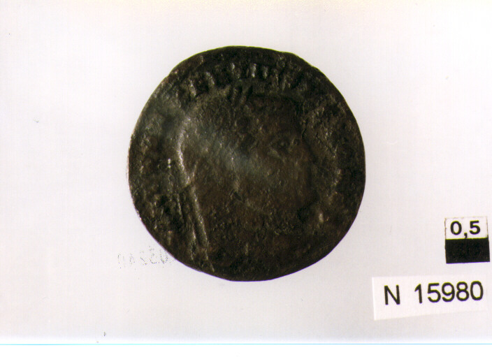 R/ testa laureata di Massenzio a destra; V/ Cartagine stante di fronte, la testa a sinistra con frutti nelle mani (moneta, asse) (sec. IV d.C)