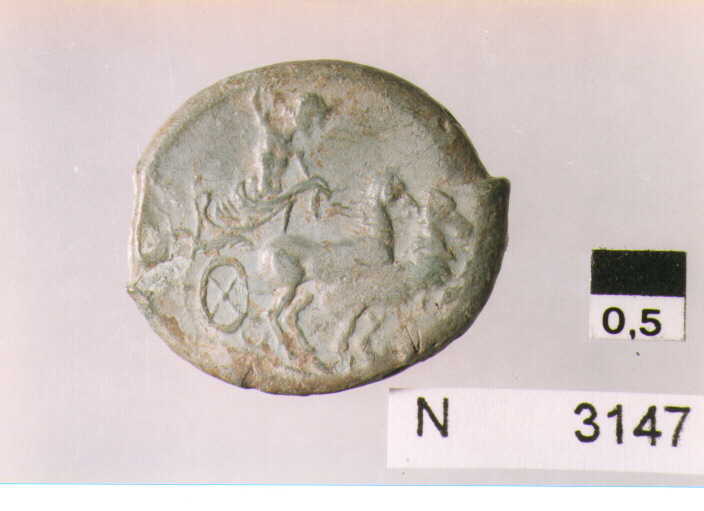 R: testa di Vulcano con pileo a destra/ V: Giove sulla biga a galoppo verso destra, che scaglia un fulmine (moneta, litra) (sec. III a.C)