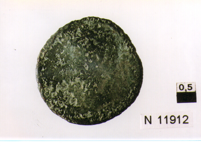 R/ testa di imperatore non id. a destra; V/ illeggibile (moneta, asse) (secc. I/ II d.C)