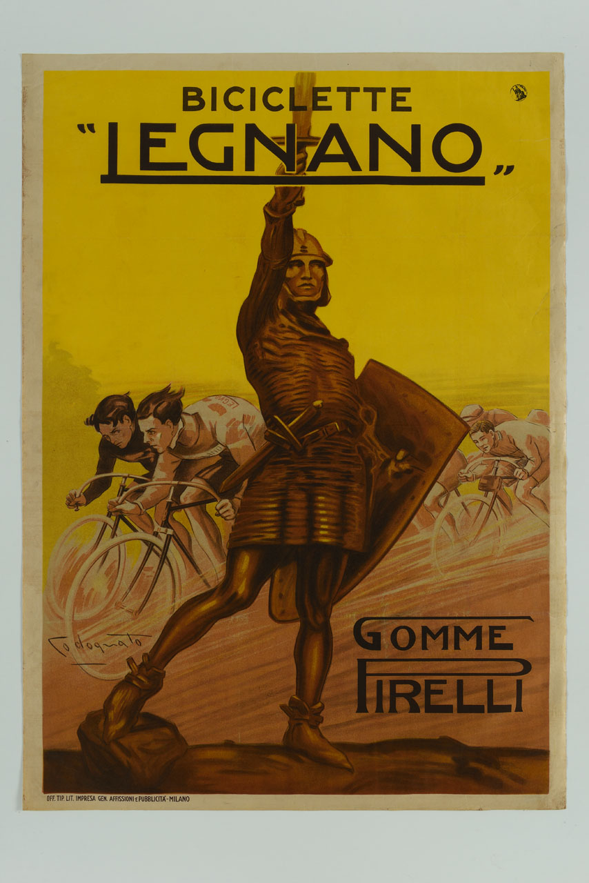 statua di Alberto da Giussano a Legnano, alle cui spalle sfreccia un gruppo di ciclisti (manifesto) di Codognato Plinio (sec. XX)