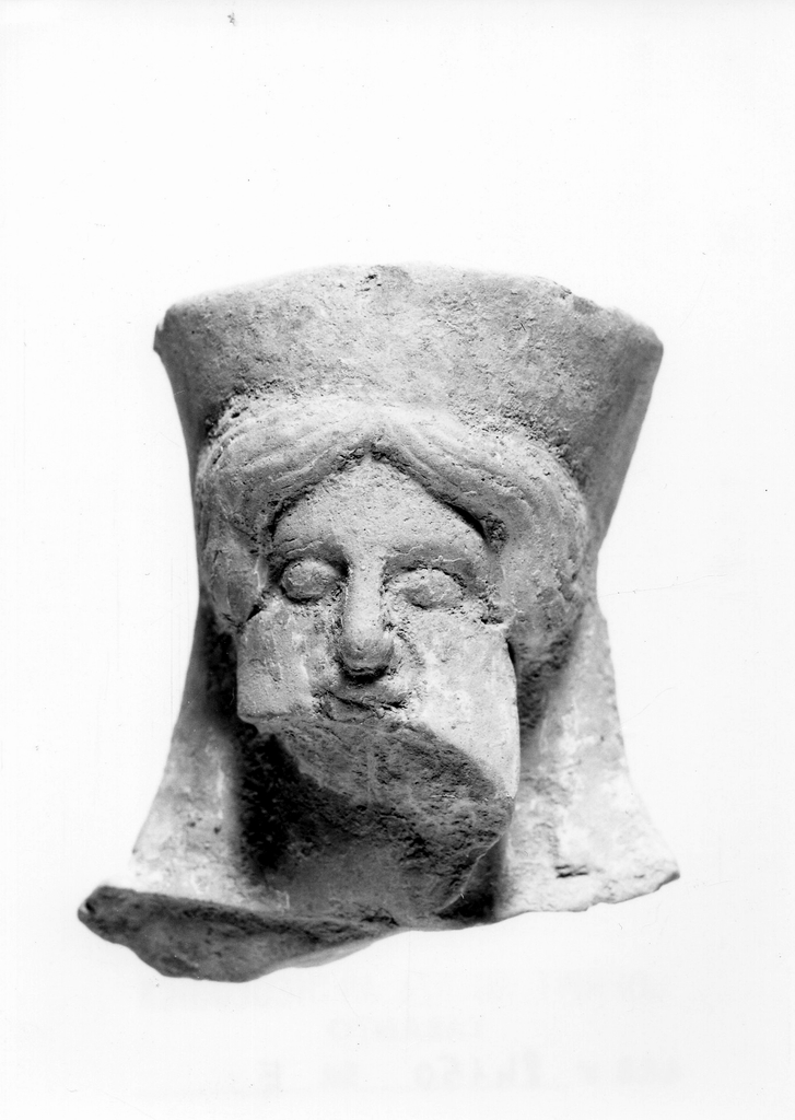 figura maschile barbata (terracotta figurata) - officina tarantina (inizio sec. IV a.C)