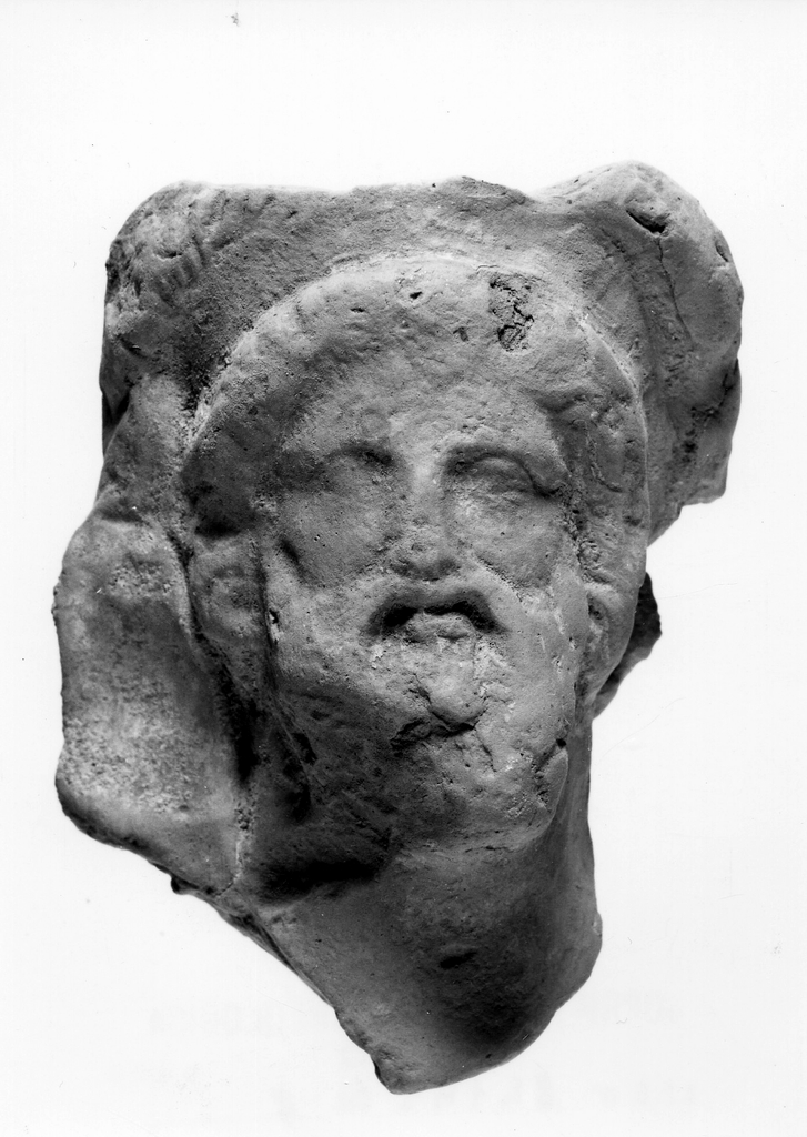 figura maschile barbata (terracotta figurata) - officina tarantina (metà sec. IV a.C)