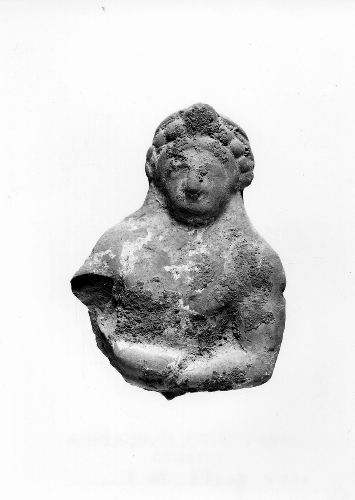 figura maschile recumbente (terracotta figurata) - officina tarantina (sec. V a.C)