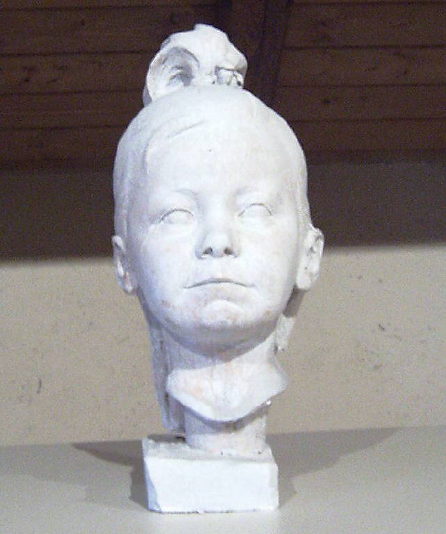 Testa di bambina, Ritratto di bambina (scultura, opera isolata) di Repossi Pietro (secondo quarto sec. XX)