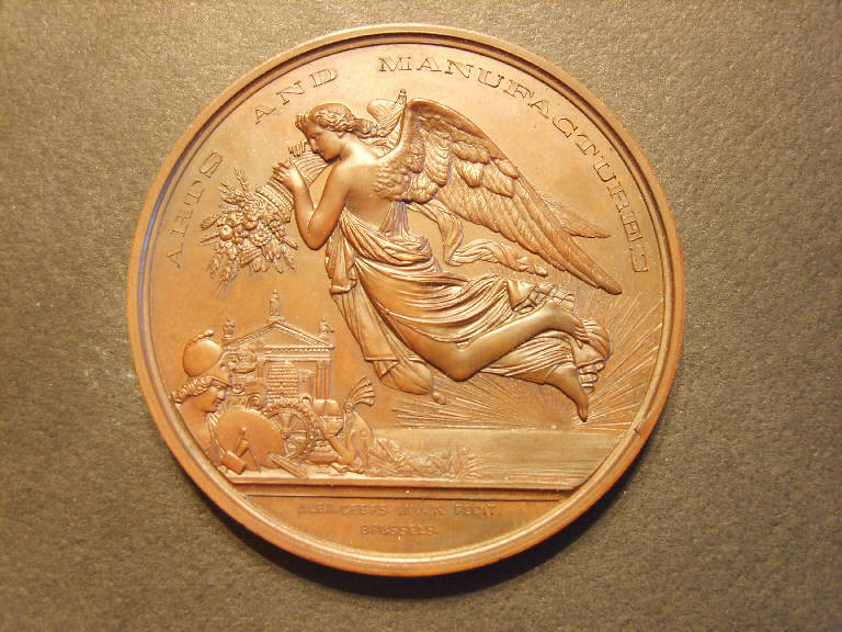 Medaglia commemorativa dell'Esposizione universale di Dublino del 1865, Vittoria alata che porta la cornucopia dell'abbondanza (medaglia, opera isolata) - ambito irlandese (sec. XIX)