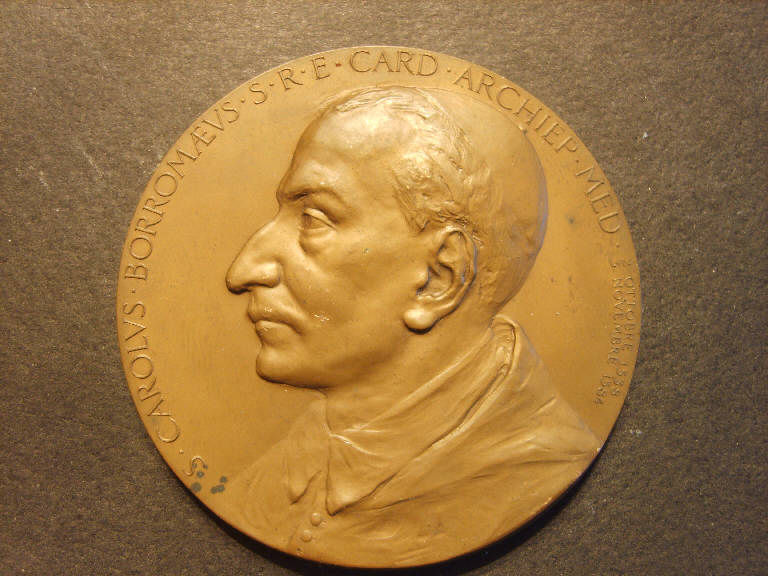 Medaglia commemorativa del terzo centenario della canonizzazione di san Carlo Borromeo, San Carlo Borromeo/ San Carlo Borromeo sale fra i santi del Paradiso accolto da Gesù cristo e dalla Madonna (medaglia, opera isolata) - ambito italiano (sec. XX)