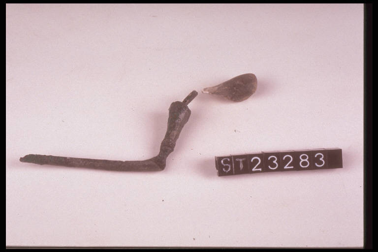 fibula ad arco composito - cultura di Golasecca (terzo quarto sec. VI a.C)