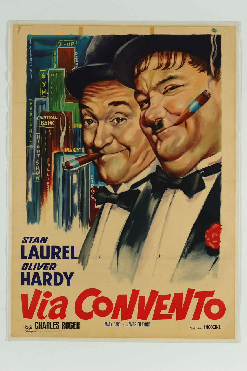 ritratto a mezzo busto di Stan Laurel e Oliver Hardy, sullo sfondo grattacieli e insegne luminose (manifesto) di Spagnoli A - ambito italiano (sec. XX)
