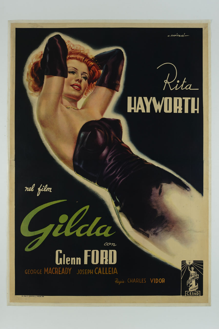 Rita Hayworth semi distesa con abito da sera senza spalline, guanti neri e collana (manifesto) di Capitani Alfredo (sec. XX)
