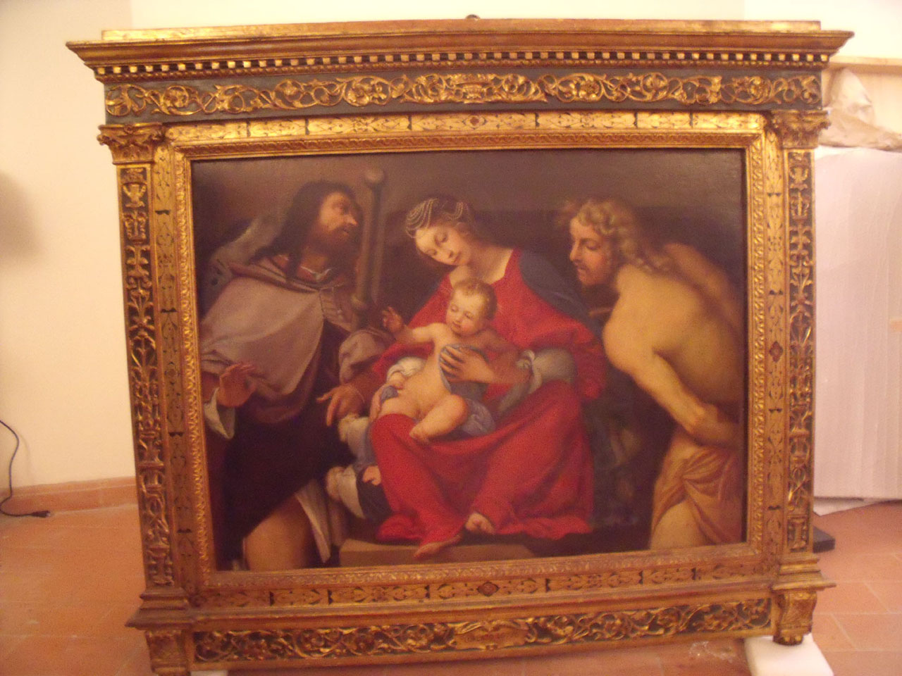 Madonna in trono col Bambino tra i santi Rocco e Sebastiano (dipinto) di Lotto Lorenzo (maniera) (sec. XVI)