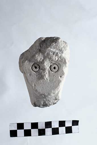 TESTA DI STELE, Nava, teste aniconiche, tipo I - produzione daunia (secc. VII/ V a.C)