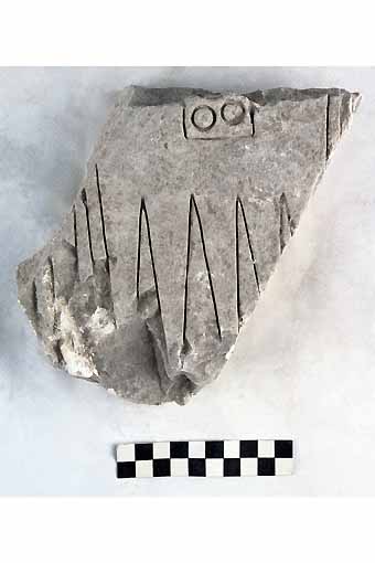 STELE/frammento - produzione daunia (secc. VII/ V a.C)