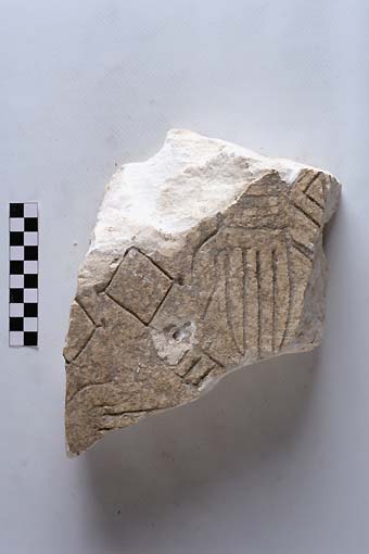 STELE/frammento - produzione daunia (sec. VII a.C)