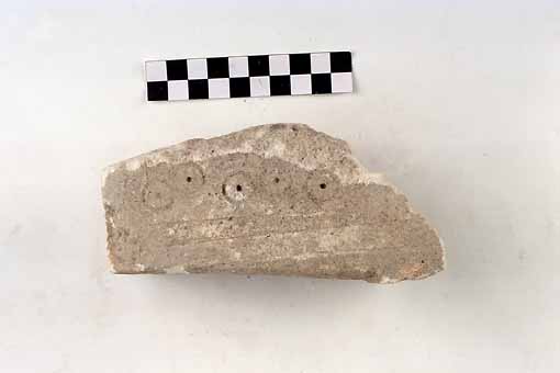 STELE/frammento - produzione daunia (sec. VII a.C)