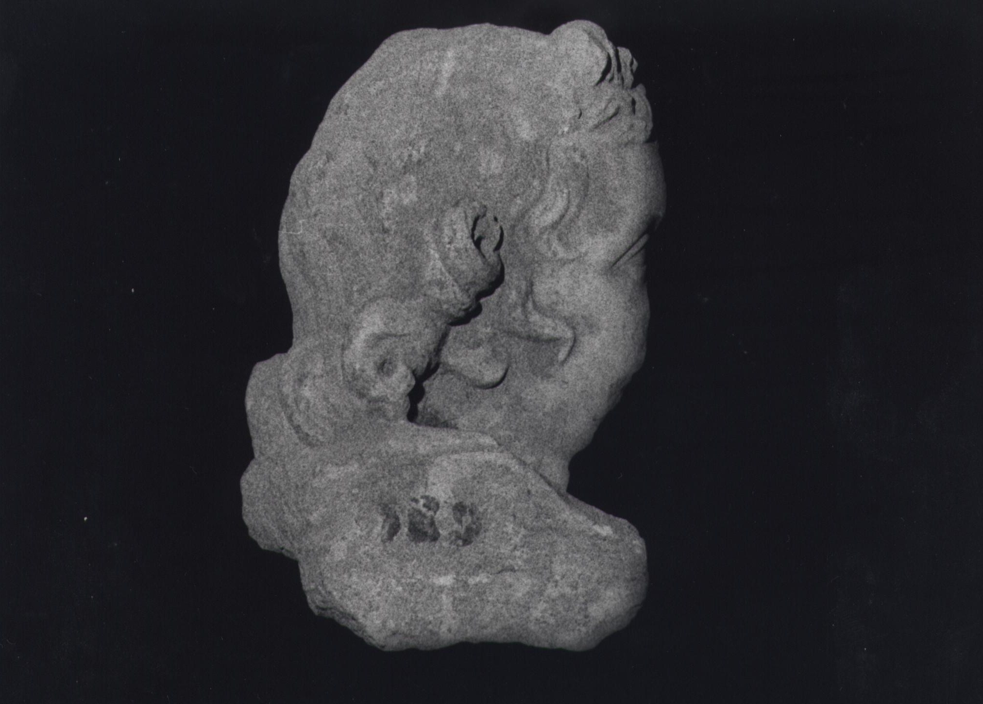 personaggi: putto (testa) (secc. I d.C./ II d.C)