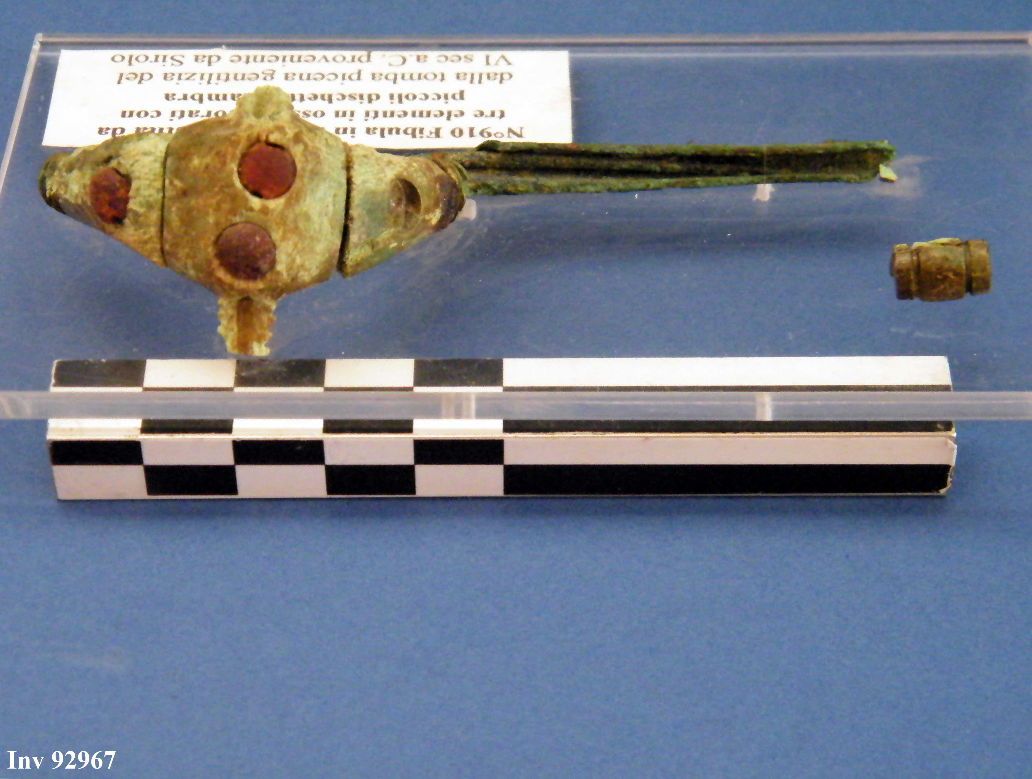 fibula, ad arco rivestito (fine VI a.C)