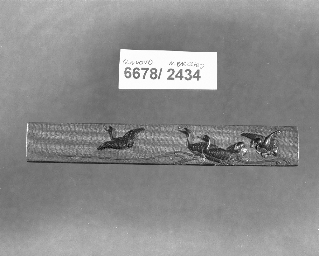 elementi decorativi (impugnatura di arma bianca, opera isolata) - ambito giapponese (secc. XVI/ XIX)