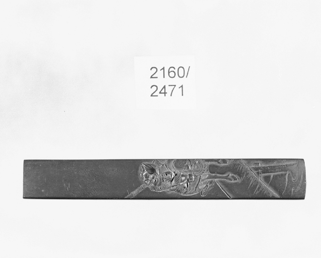 figura maschile (impugnatura di arma bianca, opera isolata) - ambito giapponese (secc. XVI/ XIX)