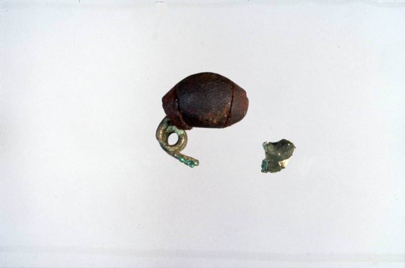 fibula ad arco rivestito (fine VII sec. a.C)