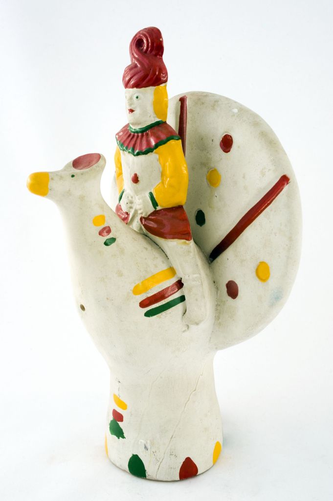 Pagliaccio, pagliaccio che cavalca un gallo (fischietto, a fessura interna, strumenti musicali) di Brunello Daniele - laboratorio (1988)