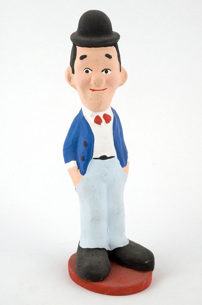 Stanlio, figura maschile (fischietto, a fessura interna, strumenti musicali) di Maggiorano Michele - laboratorio (1988)