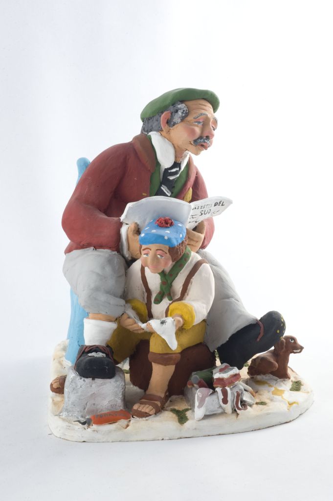 U sciuscià, uomo che lucida le scarpe di un'altro (fischietto, a fessura interna, strumenti musicali) di Gasparro Vito Lorenzo - laboratorio (2005)