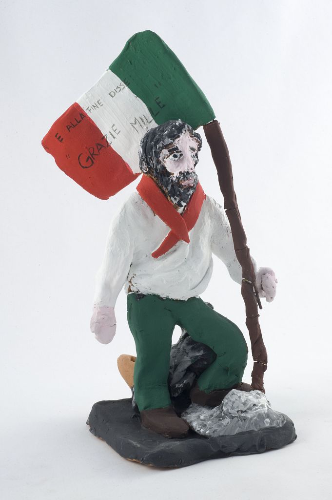 E alla fine disse grazie mille, uomo con bandiera tricolore (fischietto, a fessura interna, strumenti musicali) di Masotti Rosa - scuola (2010)