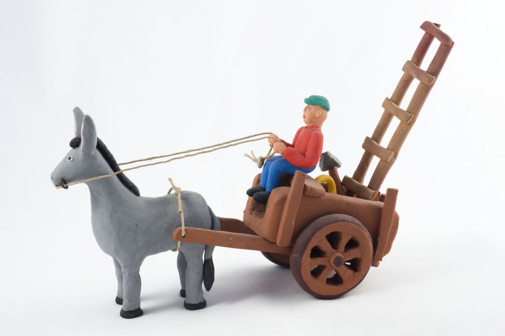 uomo su carretto (fischietto, a fessura interna, strumenti musicali) - scuola (1989 post - 2015 ante)