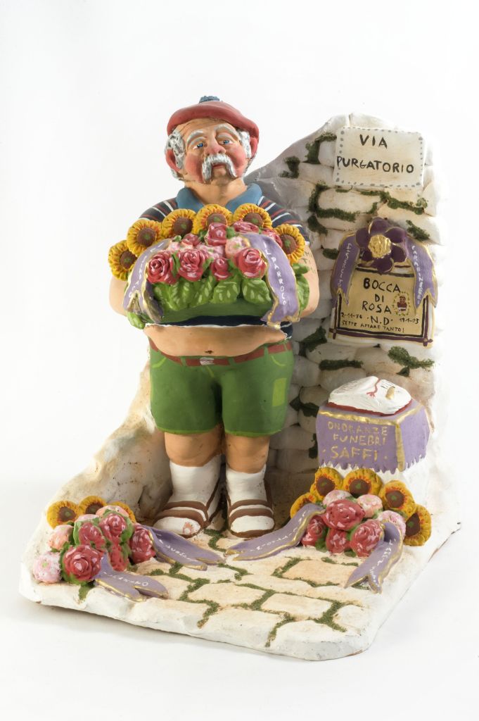 Il Maniscalco, figura maschile con composizone floreale (fischietto, a fessura interna, strumenti musicali) di Gasparro Vito Lorenzo - laboratorio (2005)