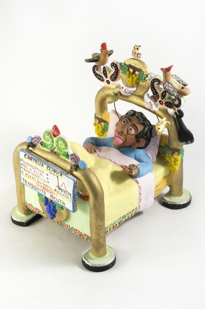 Tendonite acuta, letto con figura maschile (fischietto, a fessura interna, strumenti musicali) di Lasorella Filippo (ceramista) - laboratorio (2004)