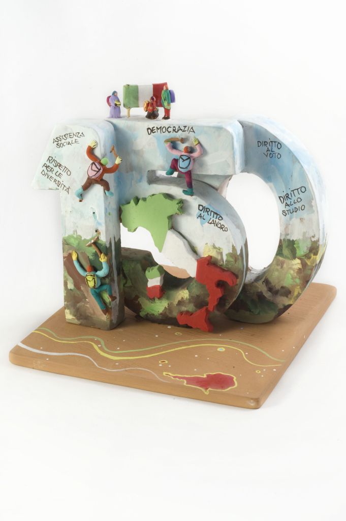 La conquista dell'unità d'Italia, 150 con penisola italiana e figure maschili (fischietto, a fessura interna, strumenti musicali) di Ippolito Giovanni - laboratorio (2010)