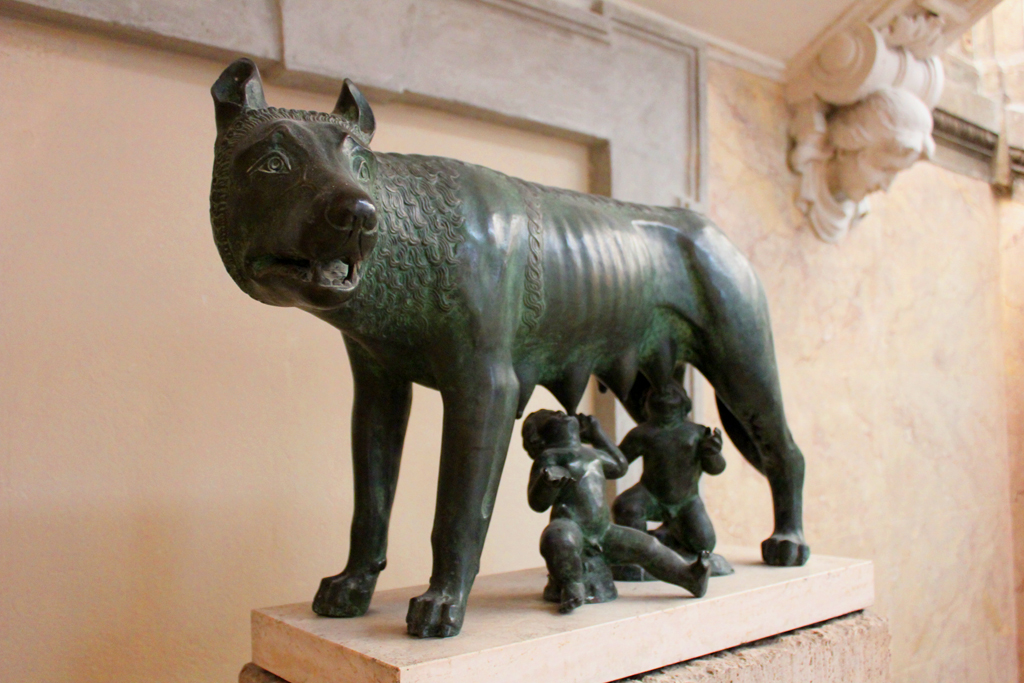 Lupa Capitolina che allatta i gemelli Romolo e Remo (monumento ai caduti - a basamento, pendant) - ambito italiano (sec. XX)