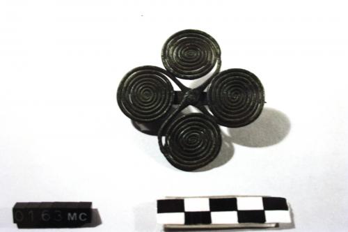 fibula a quattro spirali (inizio sec. VIII a.C)