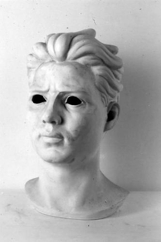 testa d'uomo (scultura) di Vogna V (sec. XX)