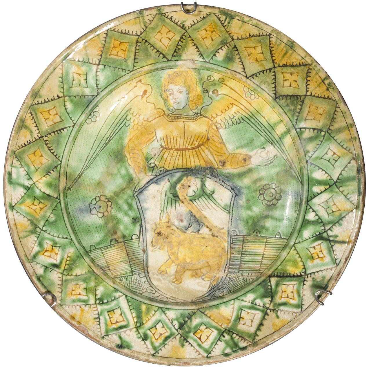 angelo reggistemma, motivi decorativi geometrici a losanga (piatto) - manifattura ferrarese (fine/ inizio secc. XV/ XVI)