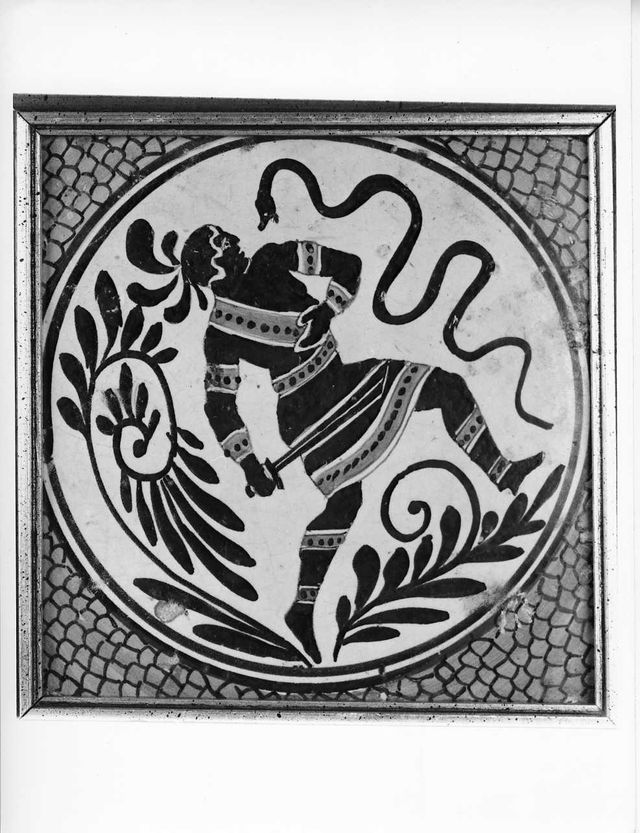 guerriero con sepente e motivi fitomorfi (mattonella) - produzione Italia meridionale (XIX)
