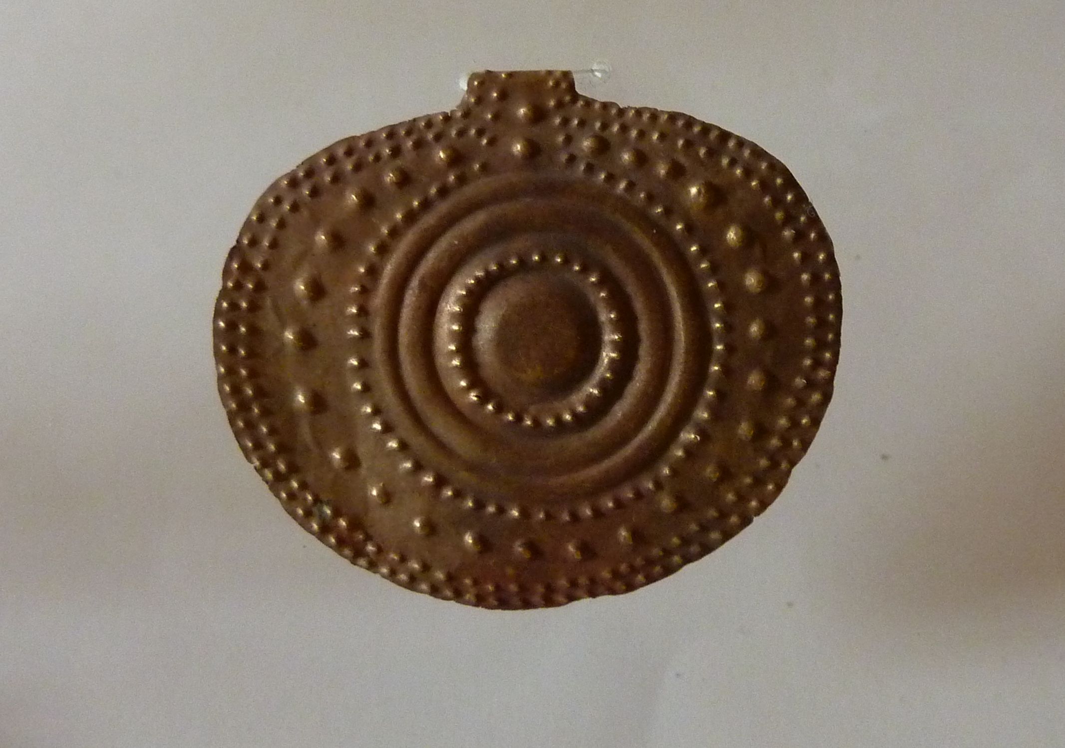 pendente discoidale (IX sec. a.C./ VIII sec. a.C)