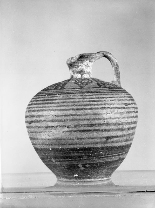 aryballos a fondo piatto (prima metà VII sec. a.C)