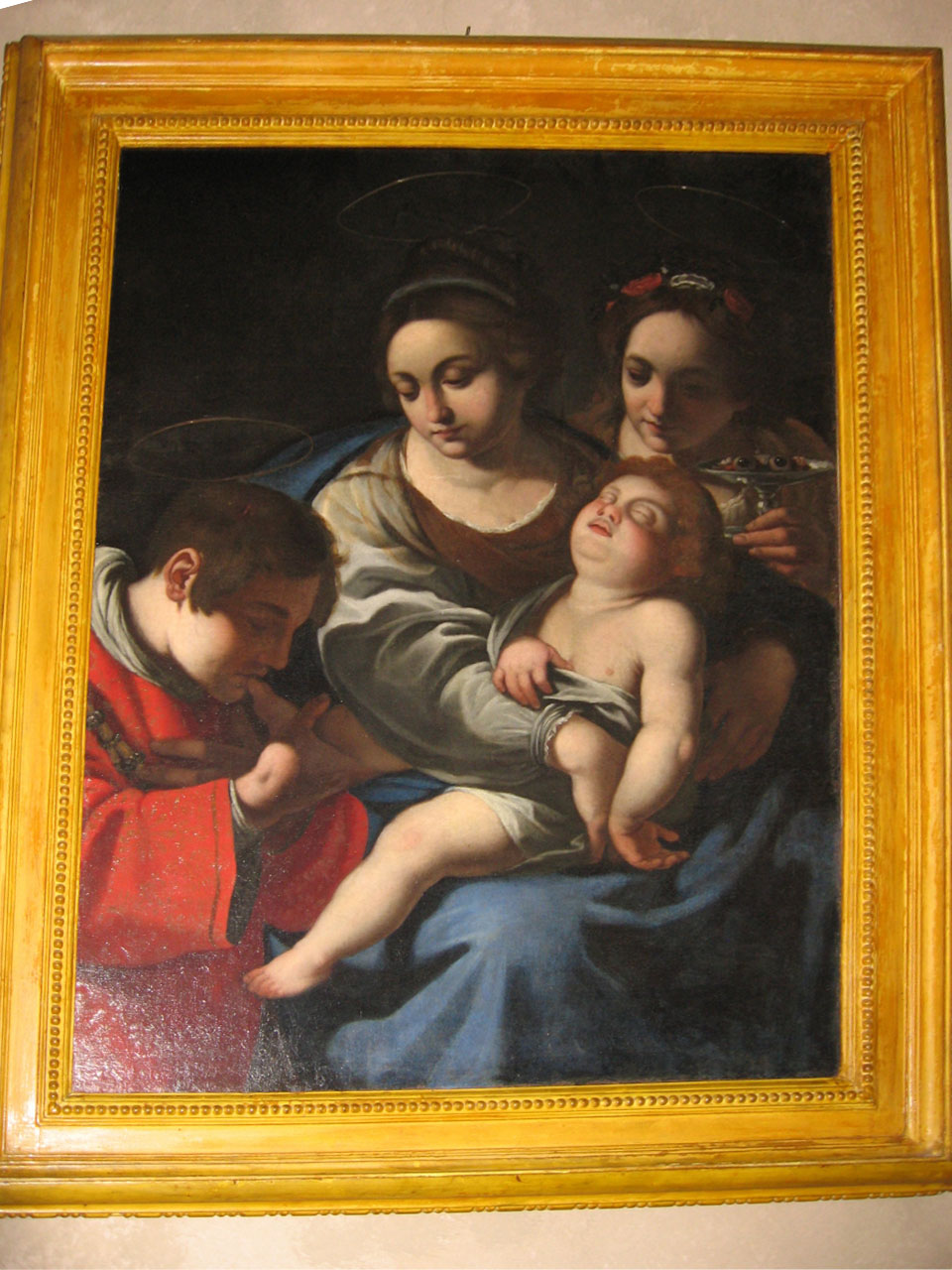 Madonna con Bambino, Santa Lucia e Santo Stefano (dipinto) di Manetti Rutilio (attribuito) (sec. XVII)