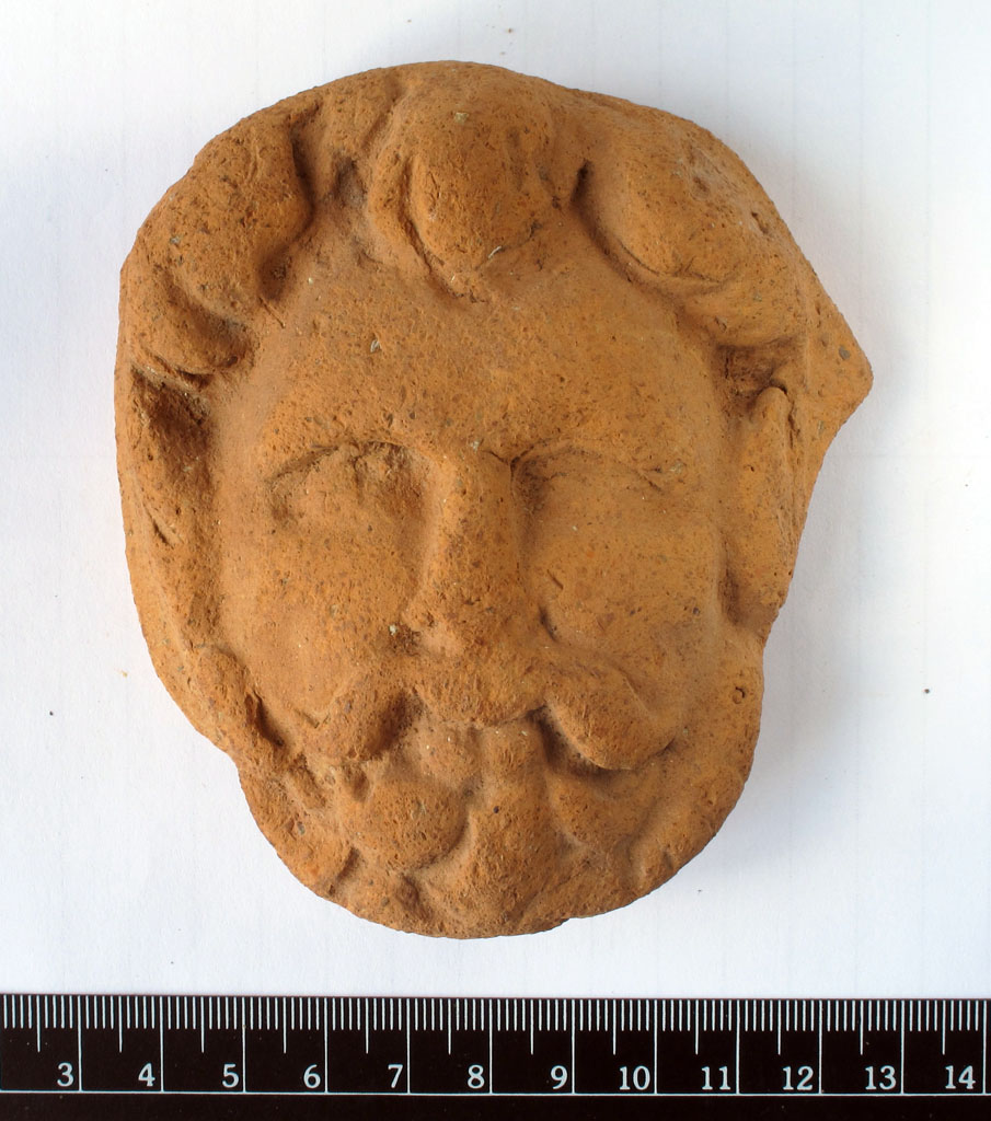 testa maschile (applique) (non id)